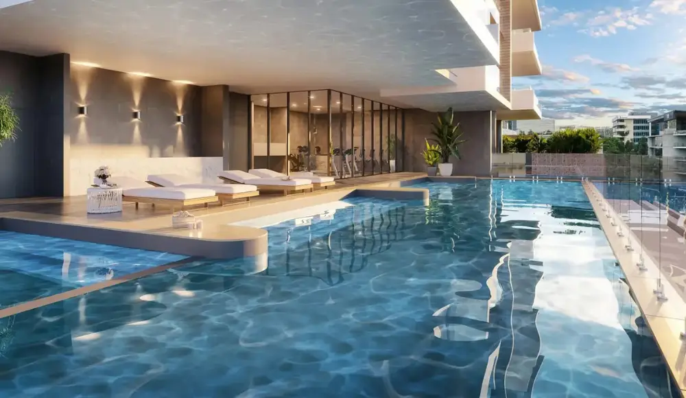 Brigade Eternia clubhouse amenities including grand central courtyard, swimming pool, kids play areas, badminton courts, outdoor gym, pickleball court, sensory garden, pet park, basketball court